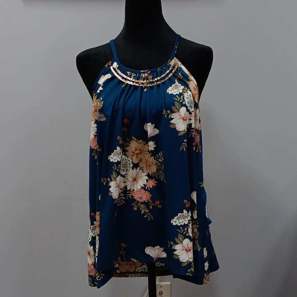 CURE M Turquoise floral top with metal gold tone accent.